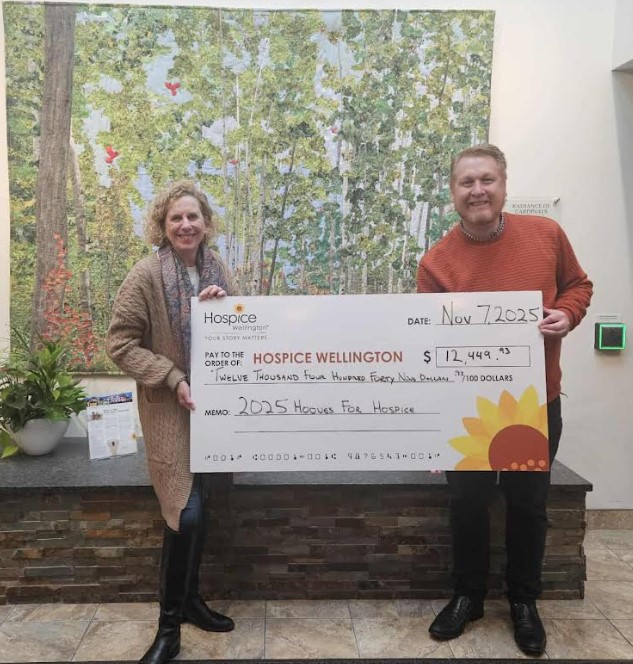 We rasied more than $12,000 in 2025! Lynn Smillie presenting a cheque for $12,449.93 to Hospice Wellington.